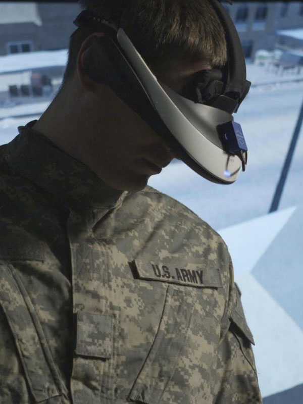 A Soldier experiencing an exposure therapy system that uses virtual reality.