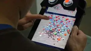 a person shown interacting with INVRSE app on an iPad